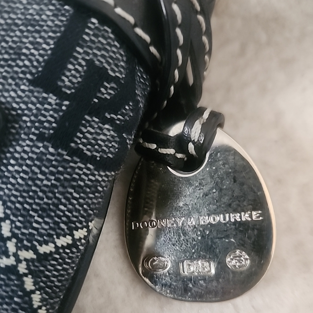 Dooney & Bourke Signature Crossbody Bag. Adjustable leather strap - Picture 6 of 9